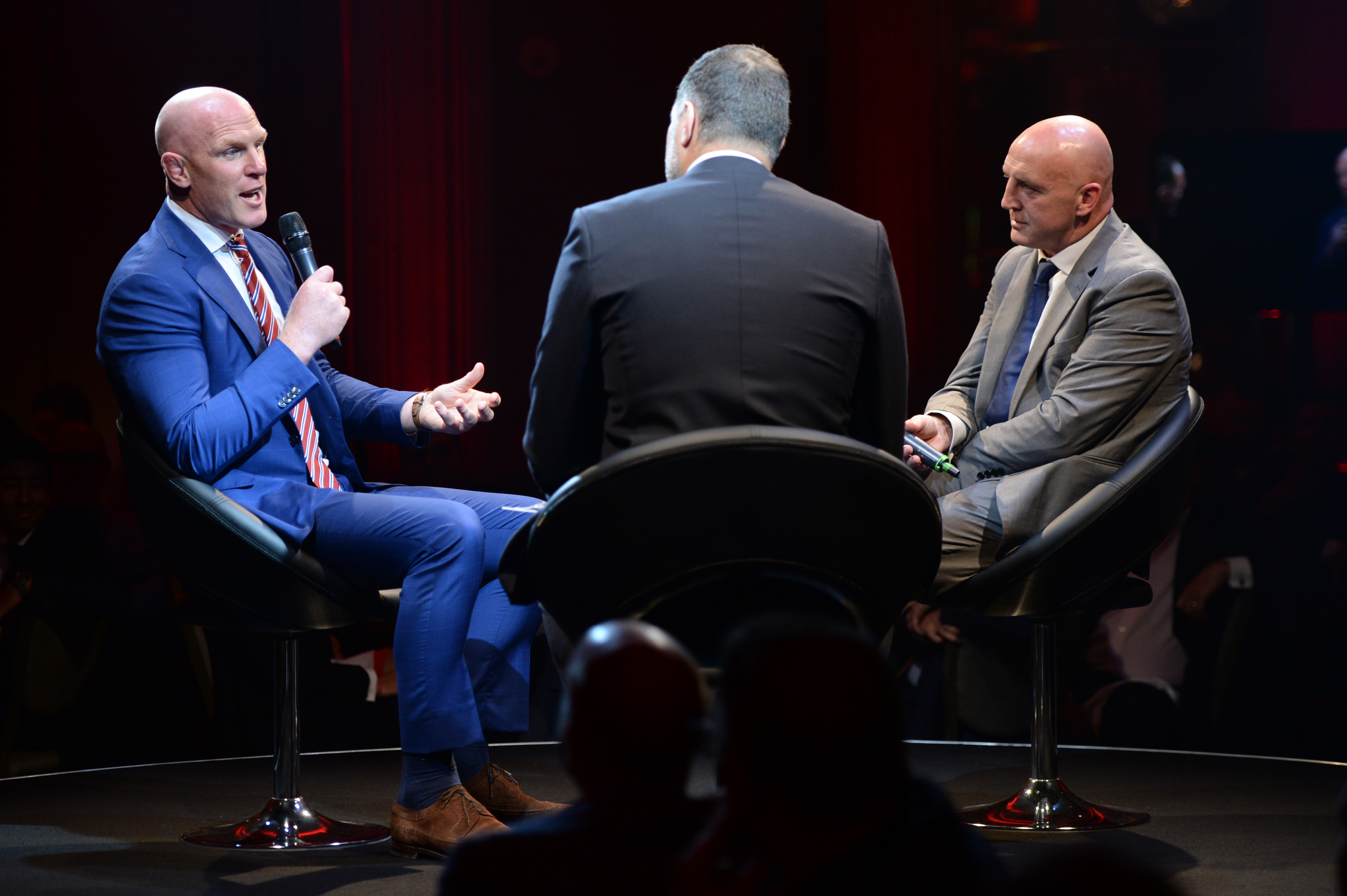 Paul O'Connell and Keith Wood speaking to Martin Bayfield.
