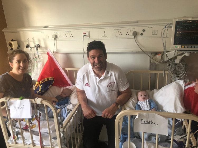 Billy Holland meeting some of the younger patients at the CUH, twins Micheal and Daithi.