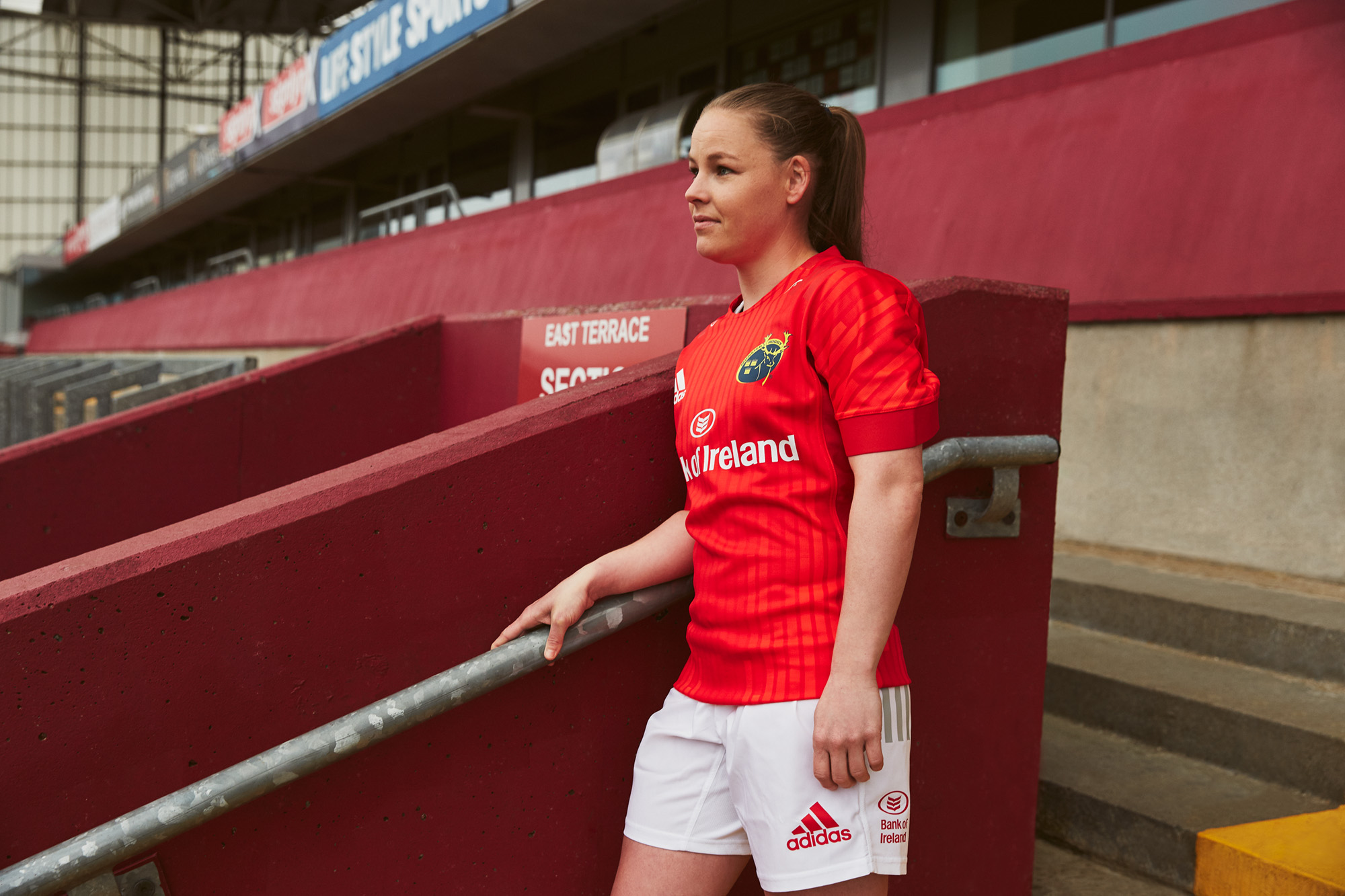 Munster player and Ireland international Nicole Cronin in the unisex Munster home jersey.