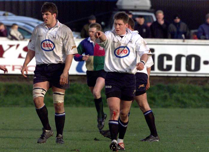 Donncha O'Callaghan and Ronan O'Gara in Cork Con colours.