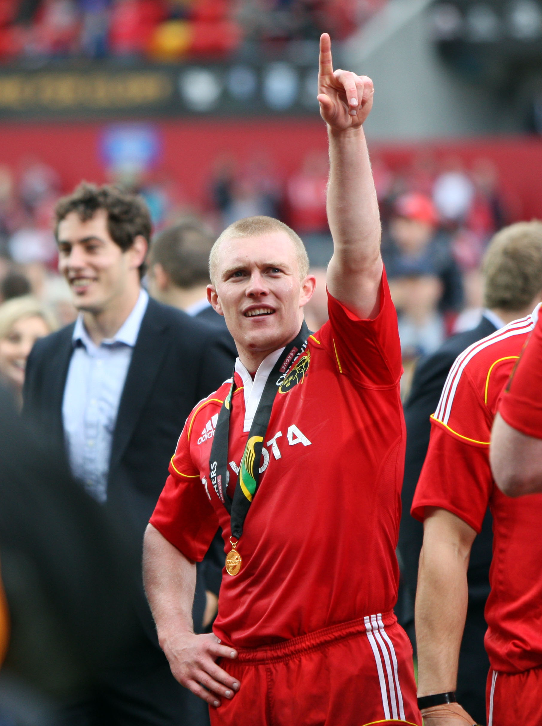 Keith Earls salutes the crowd after the 2011 league win. 