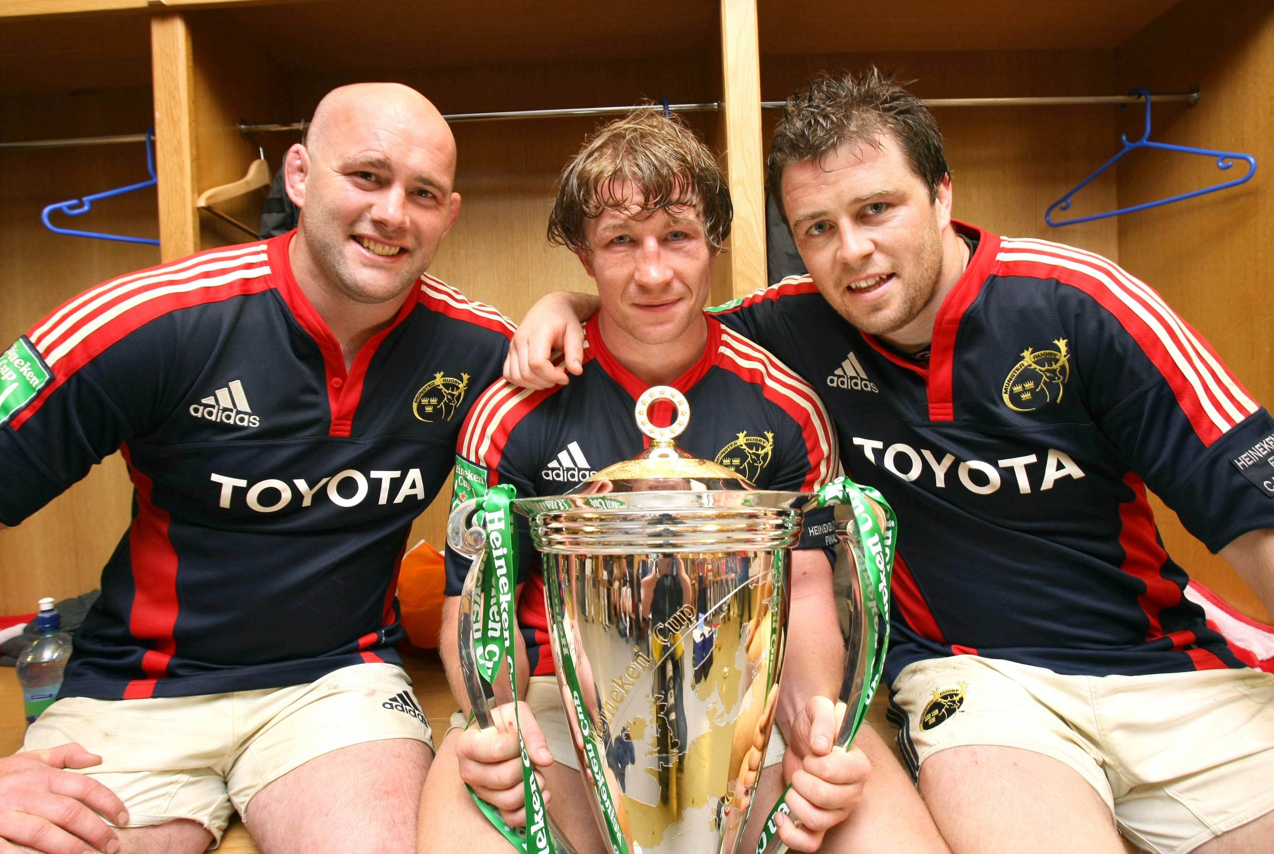 John Hayes, Jerry Flannery and Marcus Horan in the changing room with the Heineken Cup Trophy in 2008.