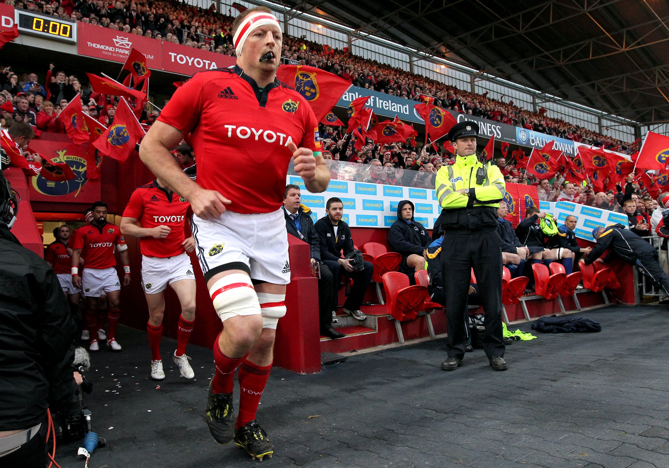 Mick O'Driscoll leads Munster out against Leinster in March 2012.