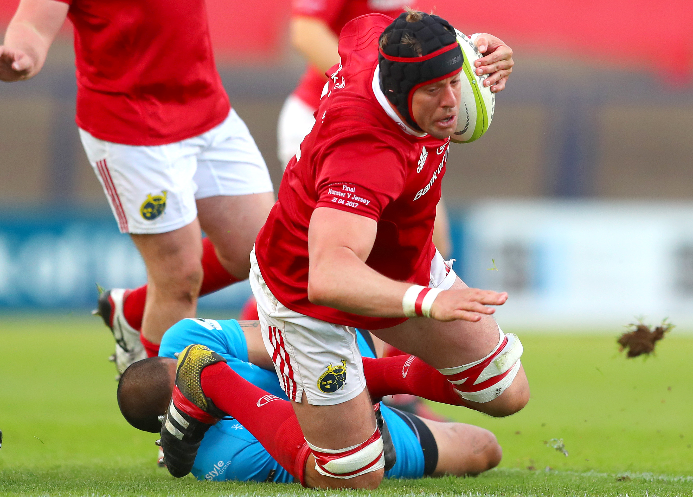Apakuki Ma'afu brings Mark Chisholm to ground.