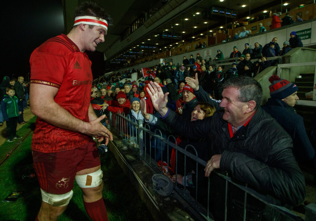 Jerry Holland congratulates his son Billy after his 200th Munster appearance. 