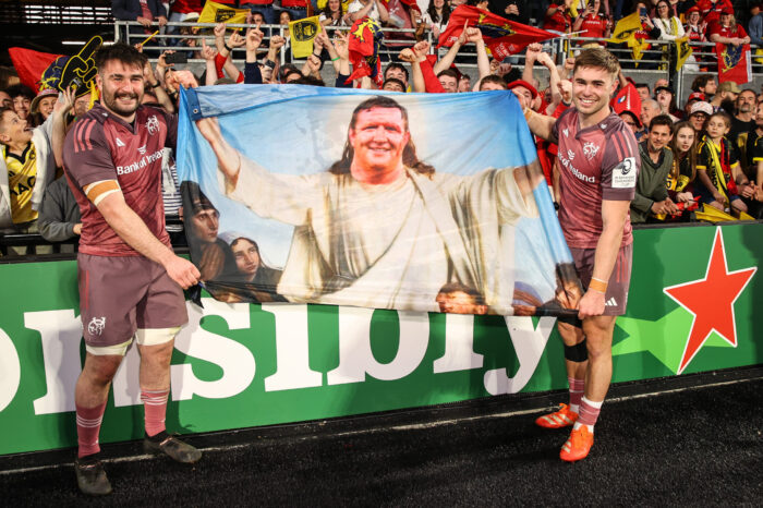 John Hodnett and Jack Crowley celebrate after the win over La Rochelle with a Stephen Archer fan flag.