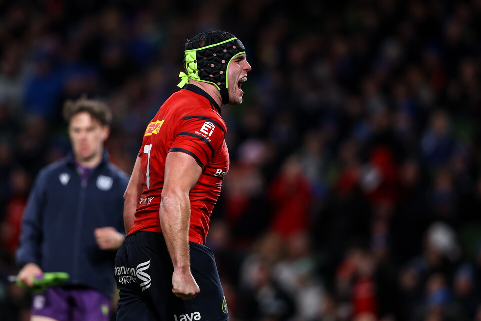 Munster player with number 1 on jersey shouts in celebration.