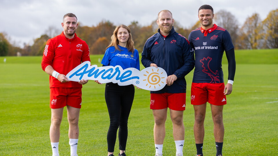 A picture showcase Aware representative Miriam Ryan and Munster players JJ Hanrahan, Jeremy Loughman and Shay McCarthy