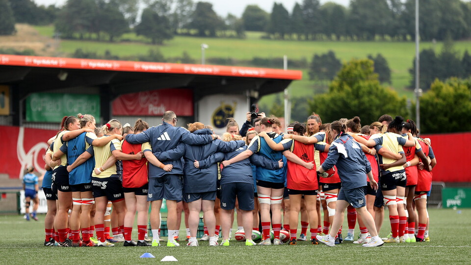 A view of the Munster Senior Women's Team in a huddle