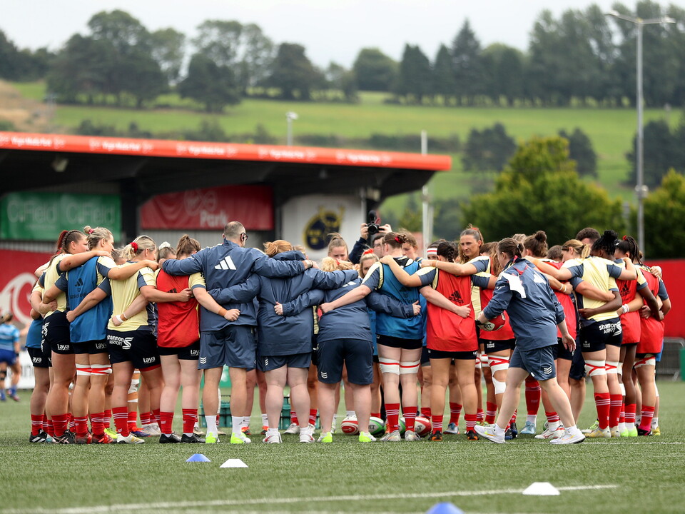 A view of the Munster Senior Women's Team in a huddle